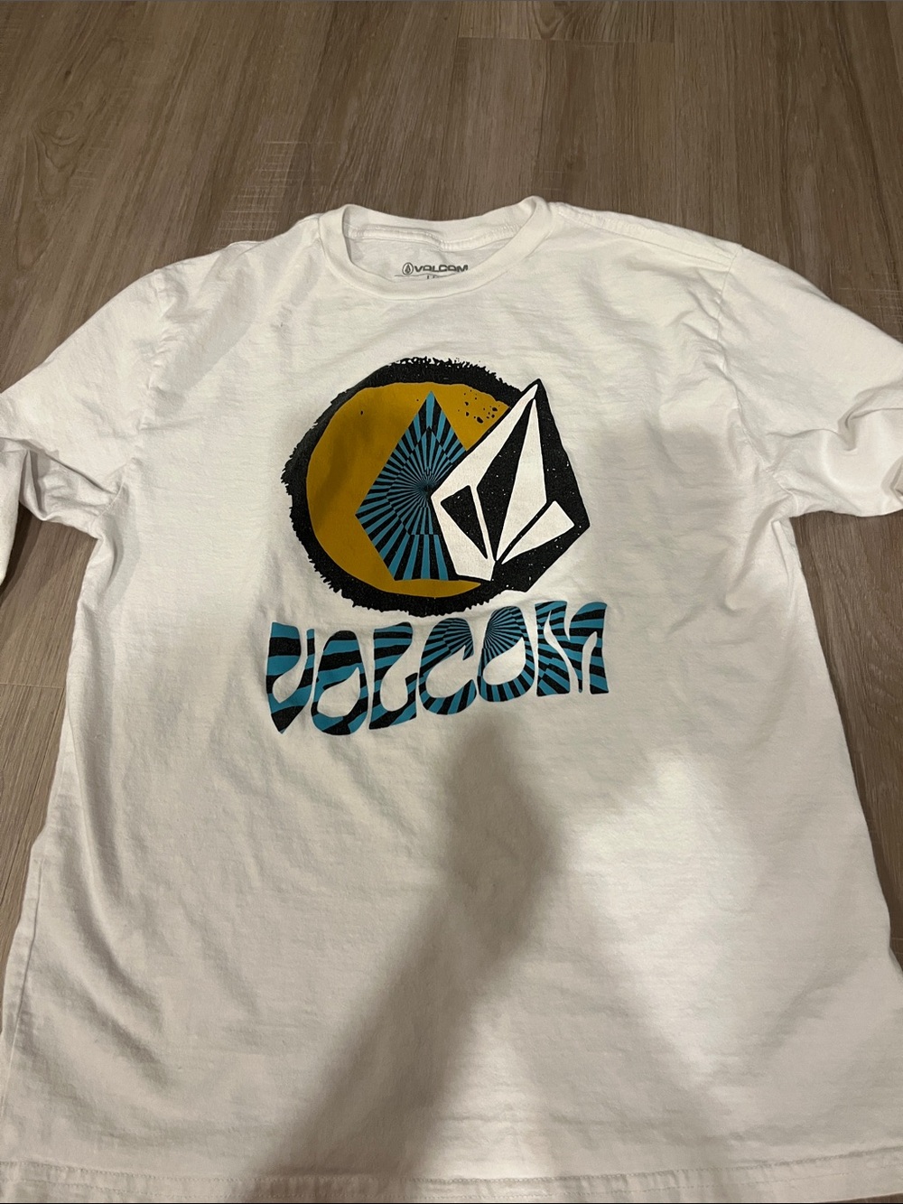 Volcom White Tee with Gold Circle and Teal Patterned Logo